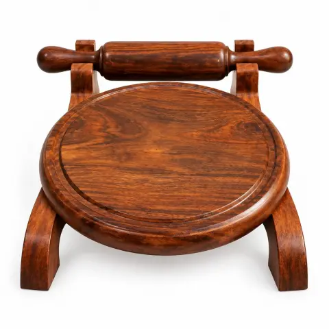Wooden chakla belan set with round rolling board, integrated wooden rolling pin, curved support legs and natural wood finish displayed on a kitchen countertop.